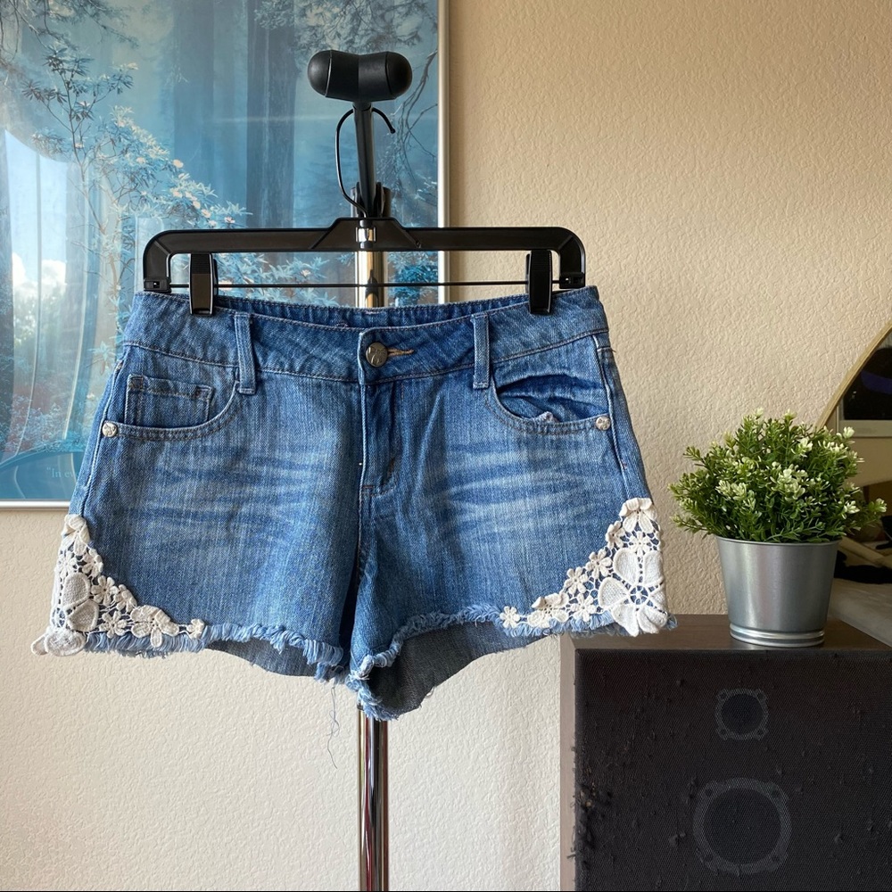 Denim shorts with flower detail